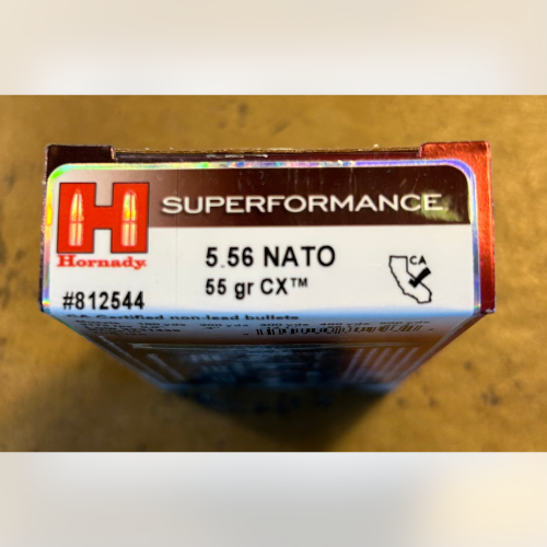 Box of Hornady Superformance 5.56 NATO ammunition, 55 grain CX. Includes California compliance logo and item number #812544 on top.