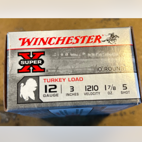 Box of Winchester Super X 12-gauge ammunition for turkey hunting. Red and black text with turkey graphic. Contains 10 rounds, 3-inch shells.