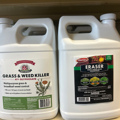 Two jugs of weed killer on a shelf; left labeled 